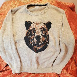 beige sweater with bear face